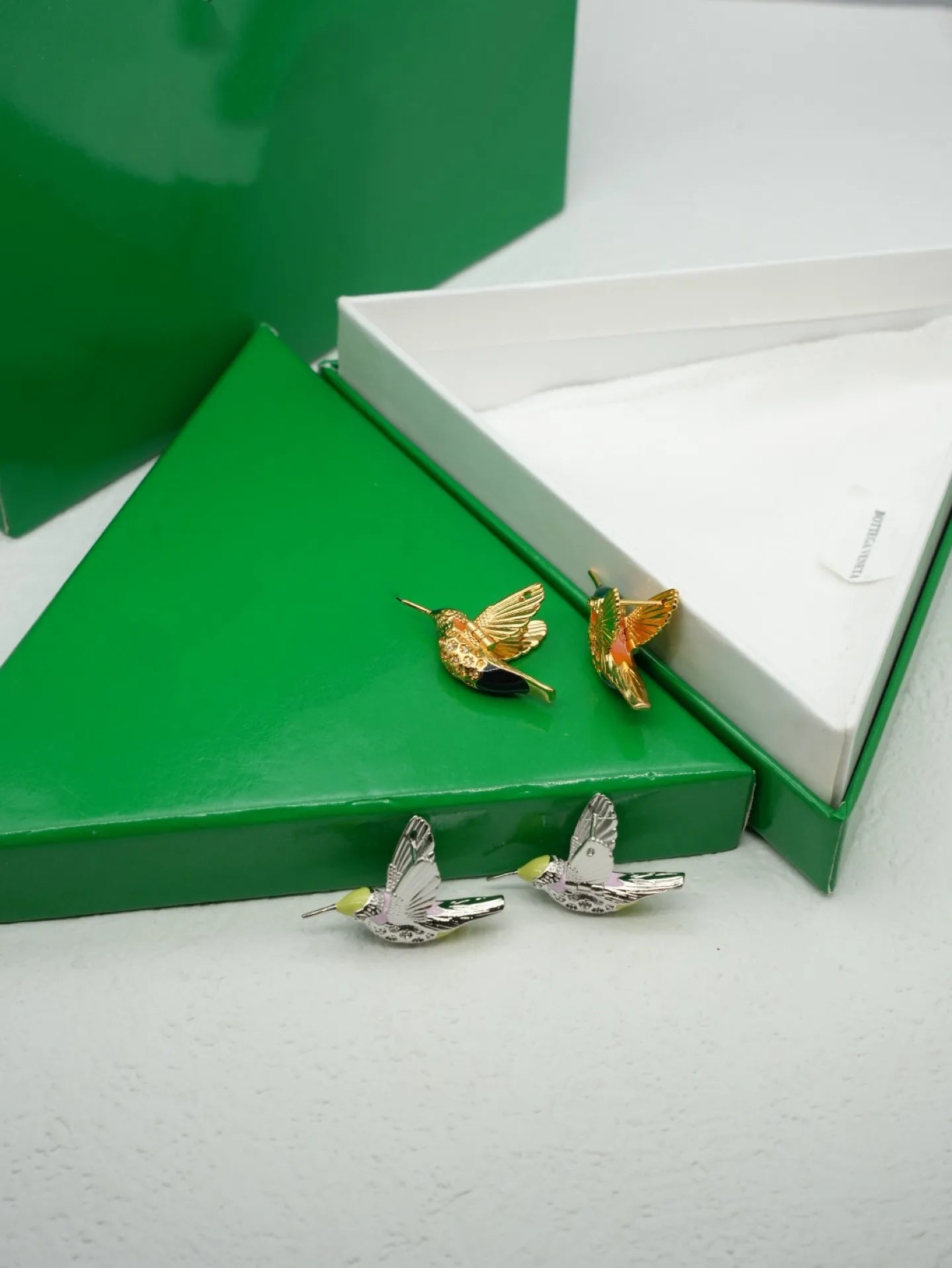 European and American retro new style Feigeo silver and gold diamond stud earrings